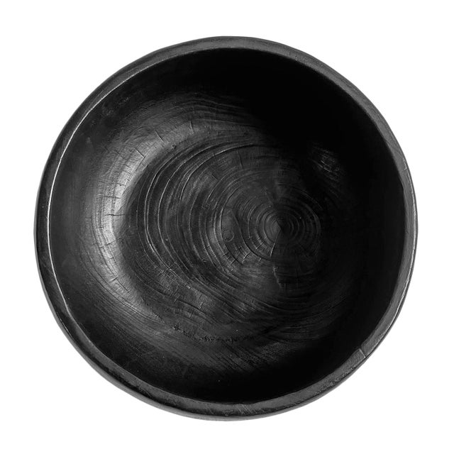 Vintage modern ebony finish smooth solid teak wood bowl from Indonesia. Perfect for holding fruit or to display special...