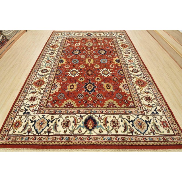 This traditional Mahal rug is hand-knotted with an all-wool pile on a cotton foundation. This beautiful oriental rug...