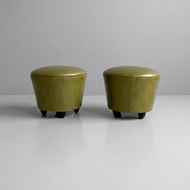 Italian modern green faux leather pouf, 1970s Pouf with a tapered circular structure, padded and upholstered in olive...