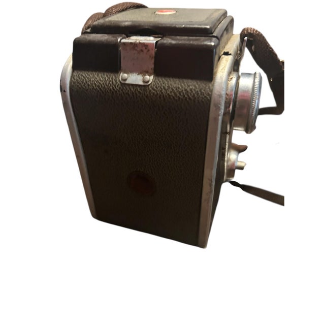 This Mid 20th Century Camera Collection will please any photography enthusiasts and enhance the décor in an office, media...