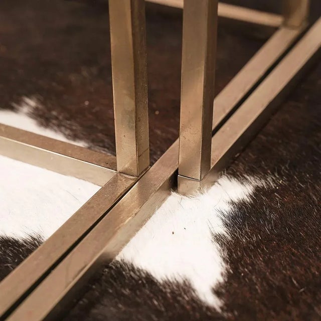 70s stackable design tables Height: 50 Width: 46 Depth: 46 This piece is attributed to the mentioned designer/maker. It...