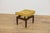 A stool from the Librenza series produced by the British G-Plan factory in the 1950s. A stool with a wooden base made of...