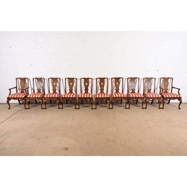 An outstanding set of ten of Chippendale or Georgian style dining chairs By Henredon USA, Circa 1980s Carved solid...