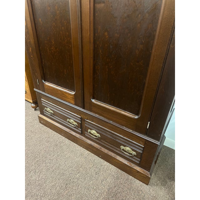 Antique mahogany colored poplar wood armoire breakdown wardrobe cabinet Two doors with two drawers beneath This is in...