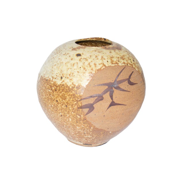 A studio pottery vase by American ceramicist Jack O'Leary (1918-1981) of Tariki Studio. In several shades of brown and...