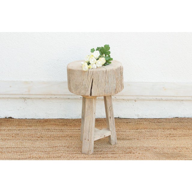 This rustic end table is unapologetically raw and incredibly robust. The Primitive Wood Stool is reconstructed from heavy...