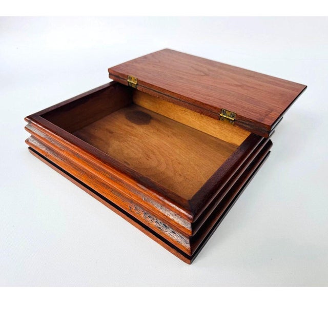 Handsome vintage hardwood document or stationery box with a warm reddish-brown finish and beautifully visible grain. The...