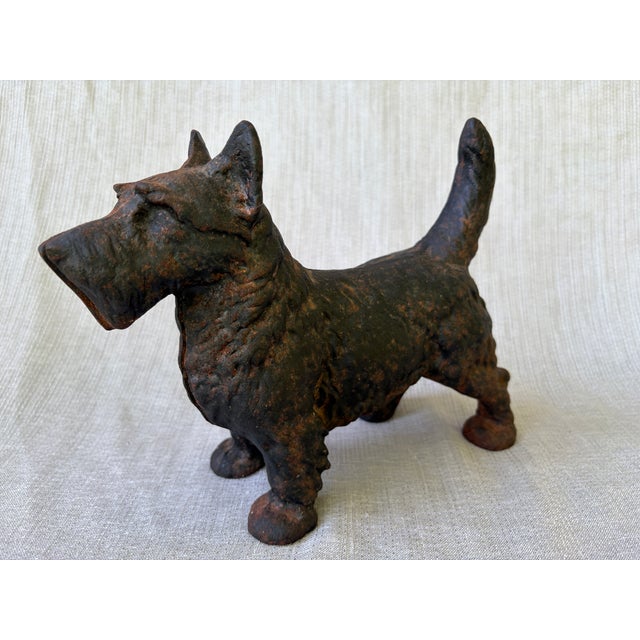 Sweet antique cast iron black figurative, standing Scottie Terrier dog doorstop. Great details in a heavy two piece...