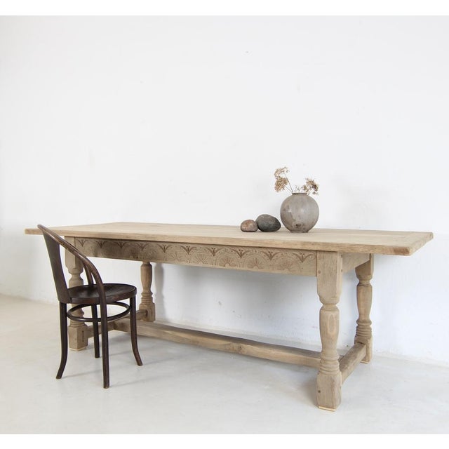 Large Spanish country-style dining table in solid oak. First half of the 20th century. Stripped of its old dark finish,...
