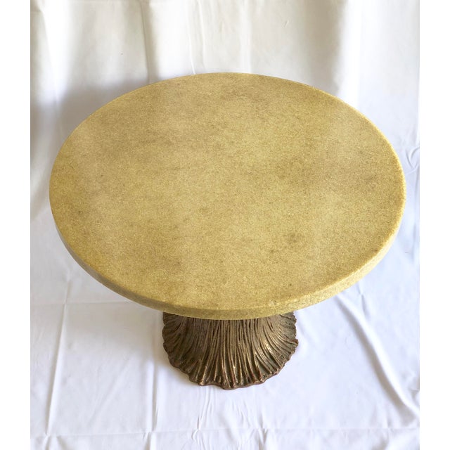 Vintage side table with Quartz top and carved metal base. Beautiful and very detailed work on the base. It’s a very sturdy...