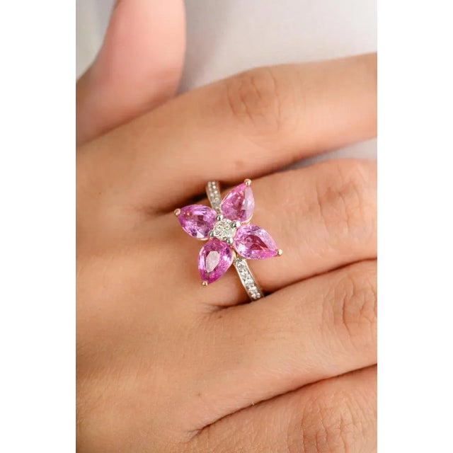 Pear Cut Pink Sapphire Diamond Floral Ring for Wedding in 14K Gold featuring natural pink sapphire of 3.57 carats and...
