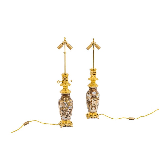 Pair of fine Satsuma earthenware lamps predominantly gold and gilded bronze. Japanese work realized circa 1880. This piece...