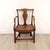 An English oak armchair with saddle seat, 19th century or earlier. Seat height 13.5".