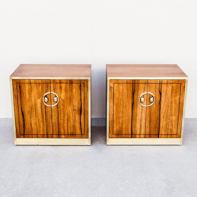 Rare pair of zebrano and brass nightstands or end tables by Mastercraft, made in the US in the 1970s. This pair features...