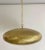 A Mid-Century Modern style all brass pendant or lantern. Featuring a spaceship oval shape, this stylish pendant is...