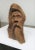 Mid Century Modern Art chip carved bust of an old man with flowing hair and beard , carved out of a solid piece of wood .