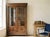 A 19th century French Louis XVI bibliotheque, or bookcase, made of solid walnut with mahogany as a secondary wood. Nice...