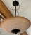 Design Plus Gallery presents the Textured Amber Bowl Pendant by Lightspann Illumination Design. A broad, amber-toned shade...