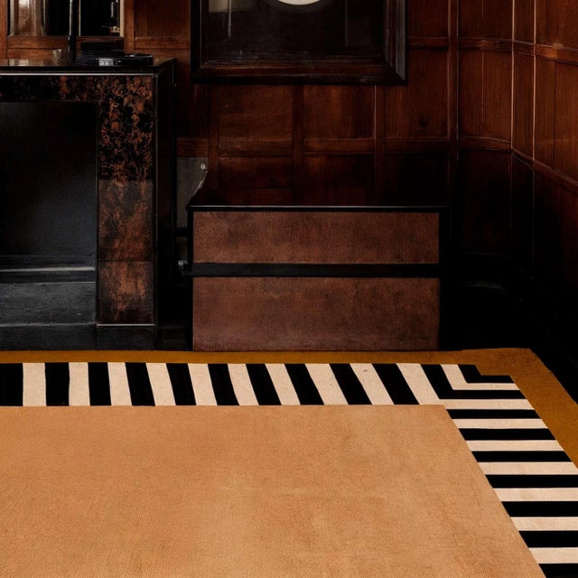 The Flirty rug showcases shades of golden beige, cream, and nude, accented by a delicate dash pattern. Light, graceful,...