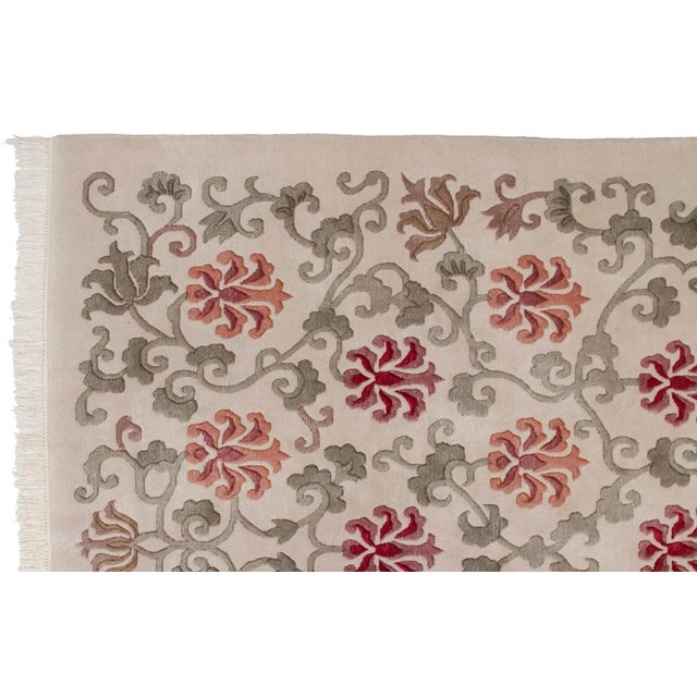 :: Allover covered field with lattice oriented scrolling vinery and buds, with interior lotus flower cross-sections in...