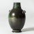 Lovely 1930s bronze vase, in a plump form with decorative handles and details. Patinated in beautiful green nuances. This...