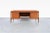 Designed by the celebrated designer Arne Vodder and crafted by H.P. Hansen, this Danish Modern executive desk is a...
