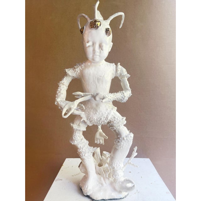"Lobster Boy #11" by Robert Hechler from his 2026 exhibition "Babes in Lobster Land," featuring a series of porcelain...