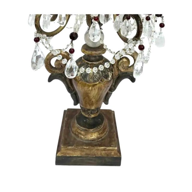 A Pair of Neoclassical style Carved Giltwood Five-Light Girandoles. Rising to an impressive 32 inches in height, each...