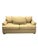 Unmarked tan sleeper sofa with a woven fabric texture and dark navy piping along the edges. It pulls out to a full-size...
