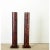 This pair of French vintage faux tortoiseshell pedestals are in the style of Doric columns to appear at once Classical and...