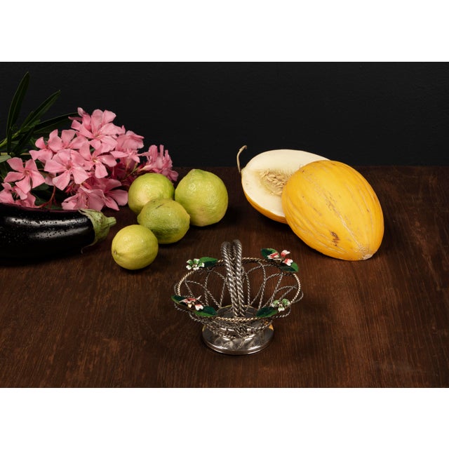 This charming small Mid Century vintage fruit basket from the 1950s features a delicate yet sturdy construction made of...