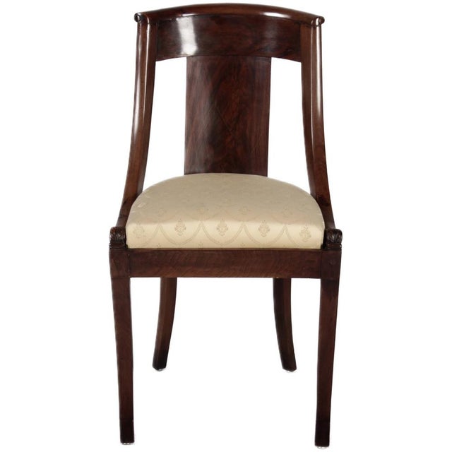 Age and Origin: The seating group likely dates from around 1820-1840 and is probably of French origin. Chair Dimensions:...