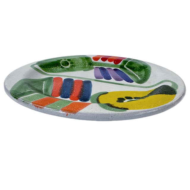 This is a brightly colored 1960's Italian DeSimone hand painted plate. The DeSimone pottery company is in Palermo Italy...