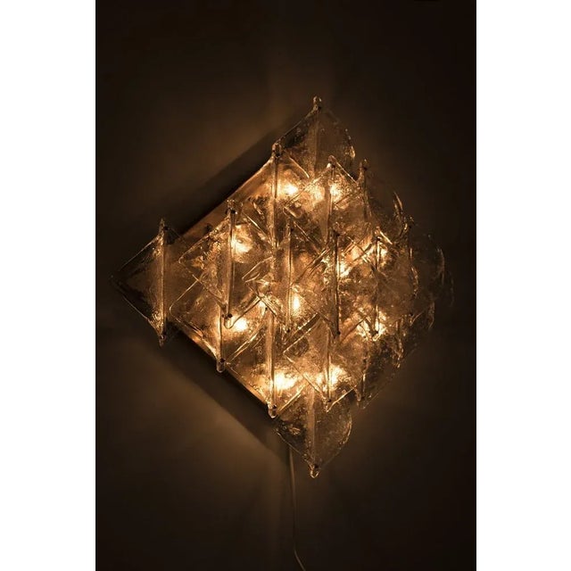 Rare diamond-shaped mazzega sconce made from glass and brass. In good vintage condition. Measurements h. 82 cm; w. 90 cm;...