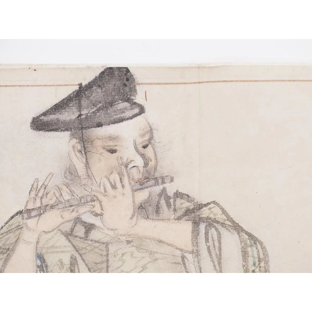 Samurai playing the Flute is an original artwork realized in the XIX Century. Original pencil, pastel and ink....