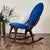 Beautiful vintage walnut parlor rocking chair with a tall sculptural back and rich cobalt blue velvet upholstery. This...
