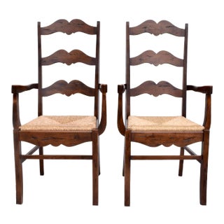 Late 20th Century European Ladder Back Folk Rush Seat Arm Chairs For Sale