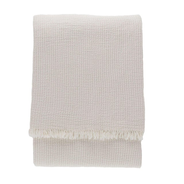 Lofty and light, woven to look and feel like the softest of sweaters, the Hoyt blanket sports organic parallel ridges of...