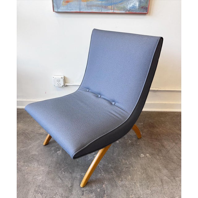 ✨Now available, sculptural vintage lounge chair Elegant boomerang form, arched wood legs, and a rich steel-blue / slate-...