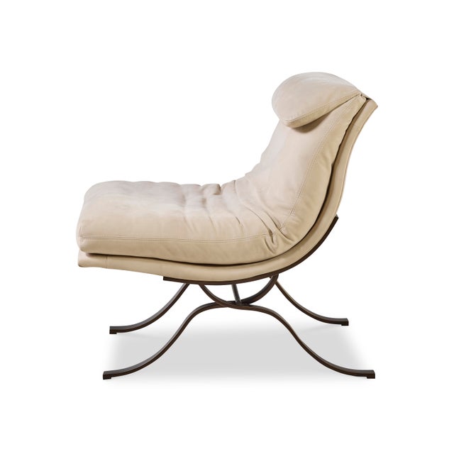 Immerse yourself in Mid-Century Italian luxury with our lounge chair and ottoman.The one piece seat and back are...