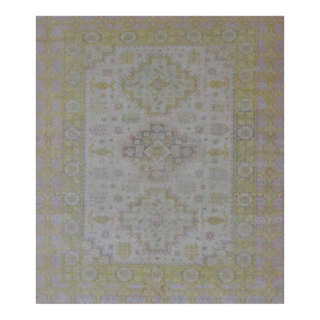 Muted Vintage Spanish Rug With Tri-Medallion Design and Floral Motifs For Sale