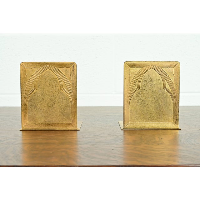 A gorgeous pair of Arts & Crafts or Art Deco period "Graduate" pattern gilt bronze bookends By Tiffany Studios (signed to...