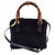 Gucci A 1990s Iconic Gucci Bamboo Navy Blue Suede Leather Hand Bag For Sale - Image 4 of 18
