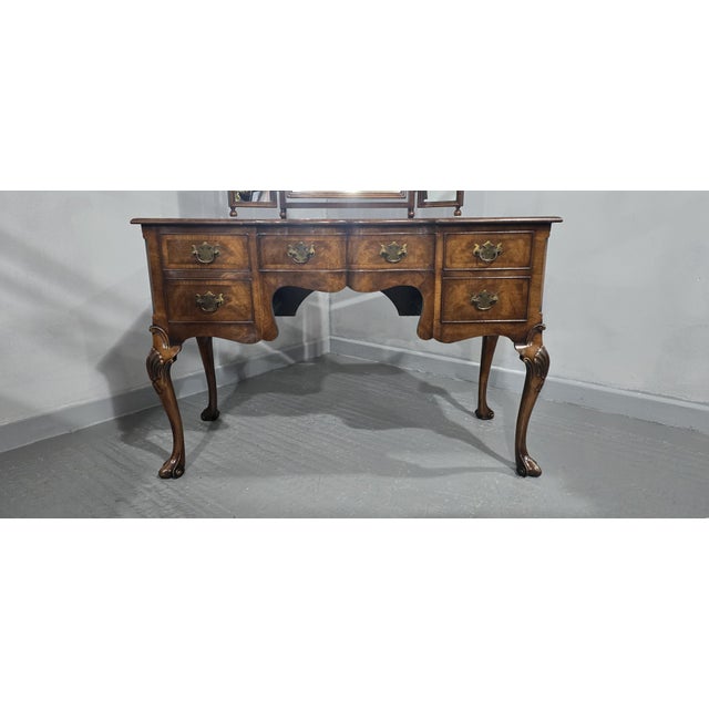 Excellent quality Queen Anne serpentine walnut dressing table, triptych mirror, slight foxing on largest mirror, brass...