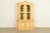 A beautiful French Regency Louis XV style breakfront bookcase or dining cabinet In the manner of Karges USA, Circa 1960s...