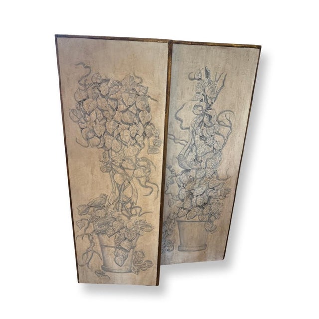 Vintage Italian Pair of Hand Paintings on wood Panels with Design of Pot leaves and birds with gold-painted border detail.