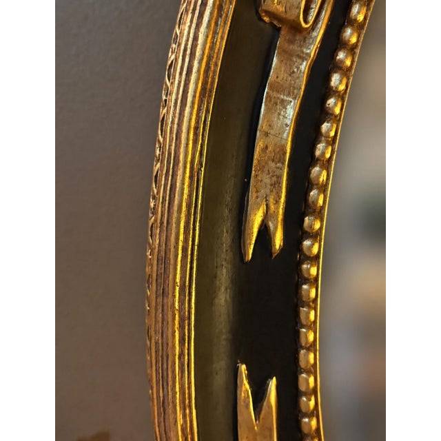1960s Vintage Federal Revival Black and Gold Parcel-Gilt Oval Wall Mirror For Sale - Image 5 of 6