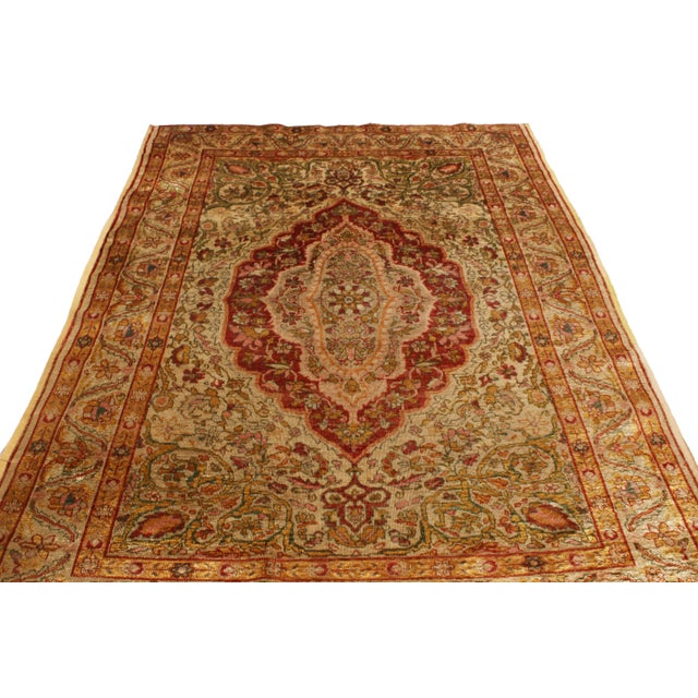 Originating from Turkey in 1880, this antique Kayseri rug enjoys a series of fine, hand knotted silk lotus depictions with...