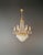 This elegant crystal chandelier has been fully restored in our Berlin workshop with great care and attention to detail....