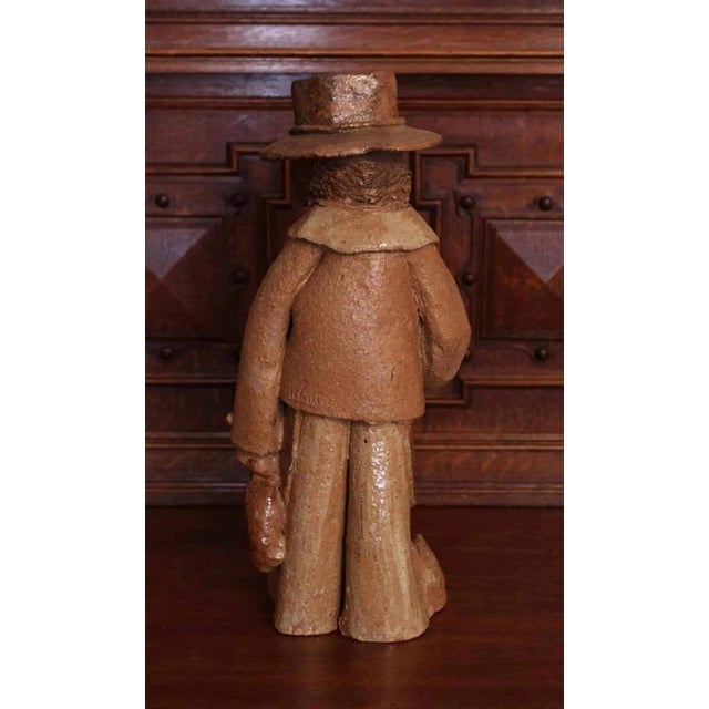 Detailed sculptures made of glazed ceramic. The sculptures are very heavy. Signed on the back. Both sculptures....